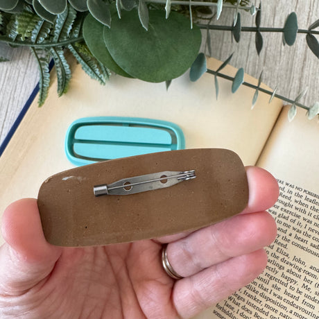 Bookshelf Hair Clip Cutter